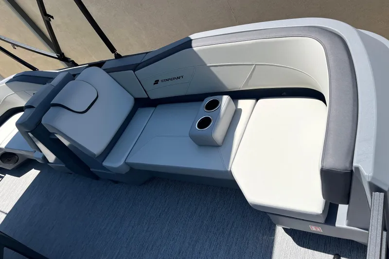 Slide: The Image of Luxurious seating on 2026 Starcraft GX 18 R boat with cup holders. - 18