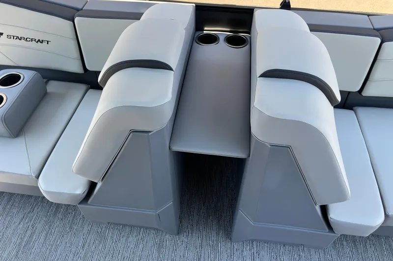 Slide: The Image of Luxurious seating area of 2026 Starcraft GX 18 R boat with cup holders. - 22