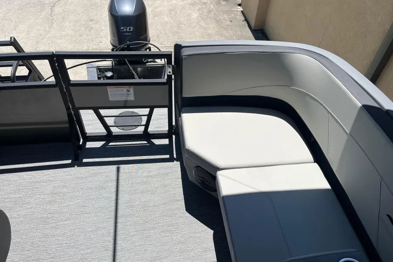 Slide: The Image of 2026 Starcraft GX 18 R boat interior with seating and Yamaha 50 engine. - 24