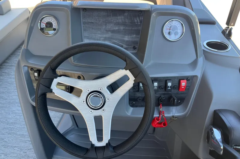 Slide: The Image of Steering console of 2026 Starcraft GX 18 R boat with gauges and controls. - 28