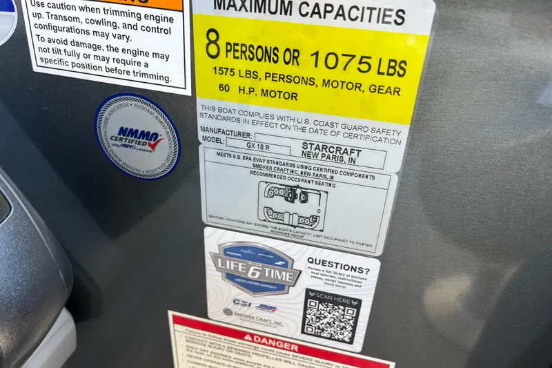 Slide: The Image of Label on Starcraft GX 18 R boat, 2026 model, showing capacity and safety certifications. - 32