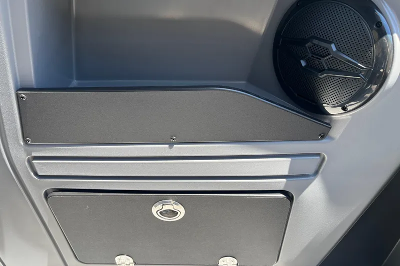 Slide: The Image of 2026 Starcraft GX 18 R boat interior with speaker and storage compartment. - 33