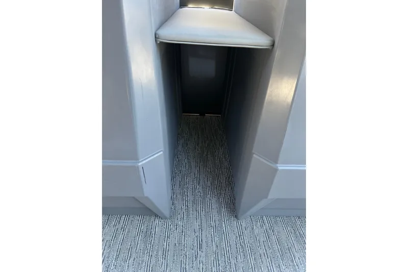 Slide: The Image of Interior view of 2026 Starcraft GX 18 R boat, featuring sleek design and modern flooring. - 37
