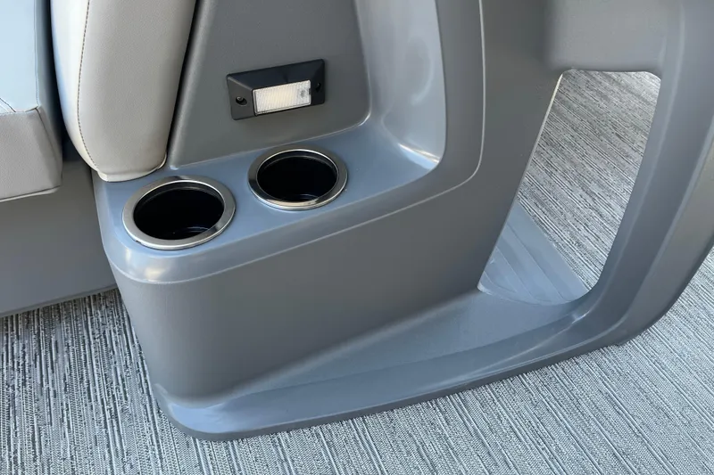 Slide: The Image of Interior of 2026 Starcraft GX 18 R boat with dual cup holders and sleek design. - 38