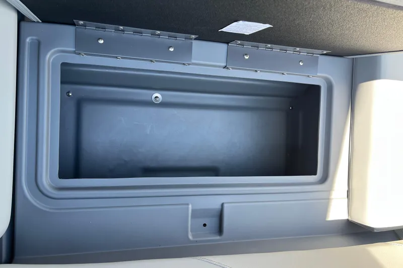 Slide: The Image of Storage compartment in 2026 Starcraft GX 18 R boat interior. - 39