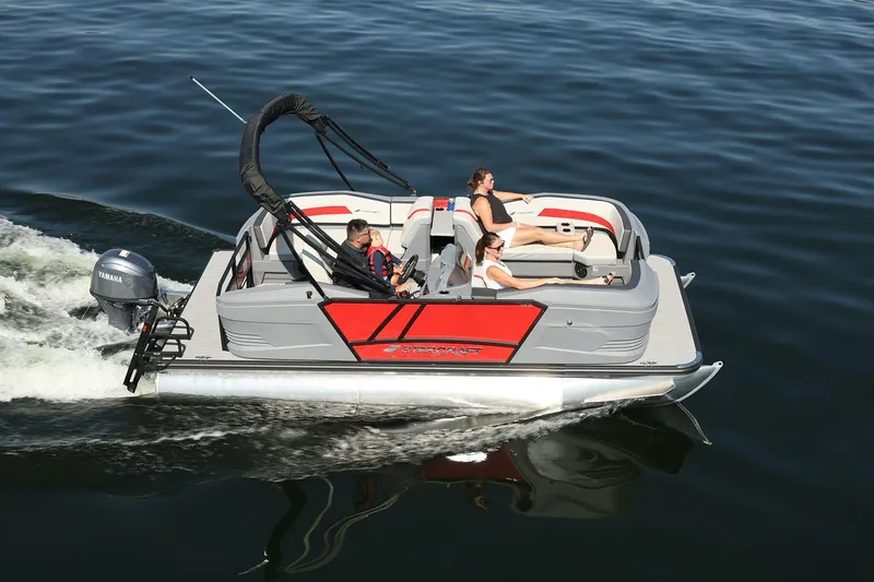 Slide: The Image of Manufacturer Provided Image: 2026 Starcraft GX 18 R pontoon boat cruising on calm water with passengers. - 4