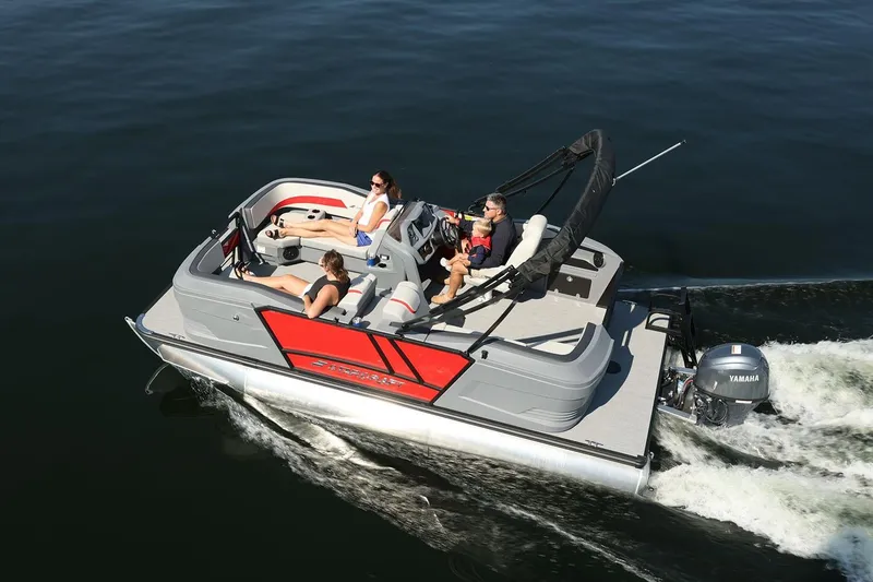 Slide: The Image of Manufacturer Provided Image: 2026 Starcraft GX 18 R pontoon boat cruising on water with passengers enjoying the ride. - 5