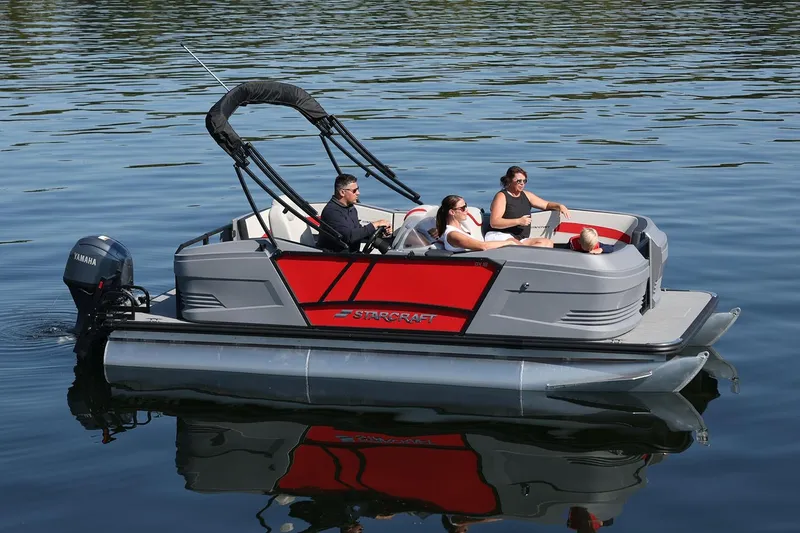 Slide: The Image of Manufacturer Provided Image: 2026 Starcraft GX 18 R pontoon boat on calm water with passengers enjoying a ride. - 6