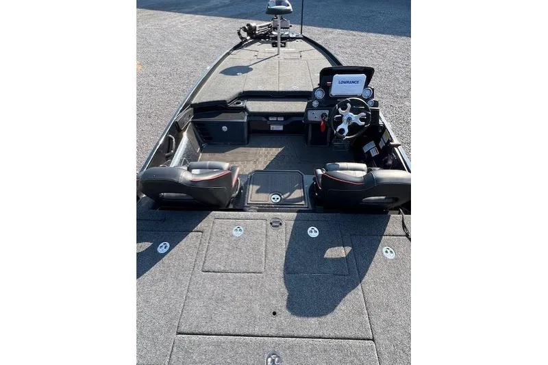 Slide: The Image of 2024 Nitro Z21 XL boat interior with steering console and seating. - 4