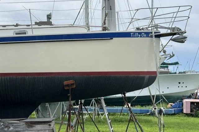 Slide: The Image of 1983 Nonsuch Cat Ketch sailboat "Tally On" on stands, ready for maintenance. - 21