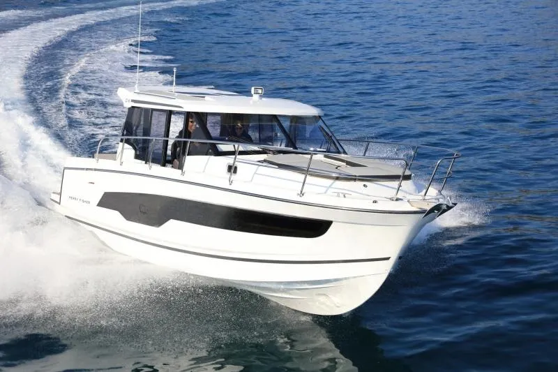 The Image of 2020 Jeanneau NC1095 motorboat cruising on open water. - 0