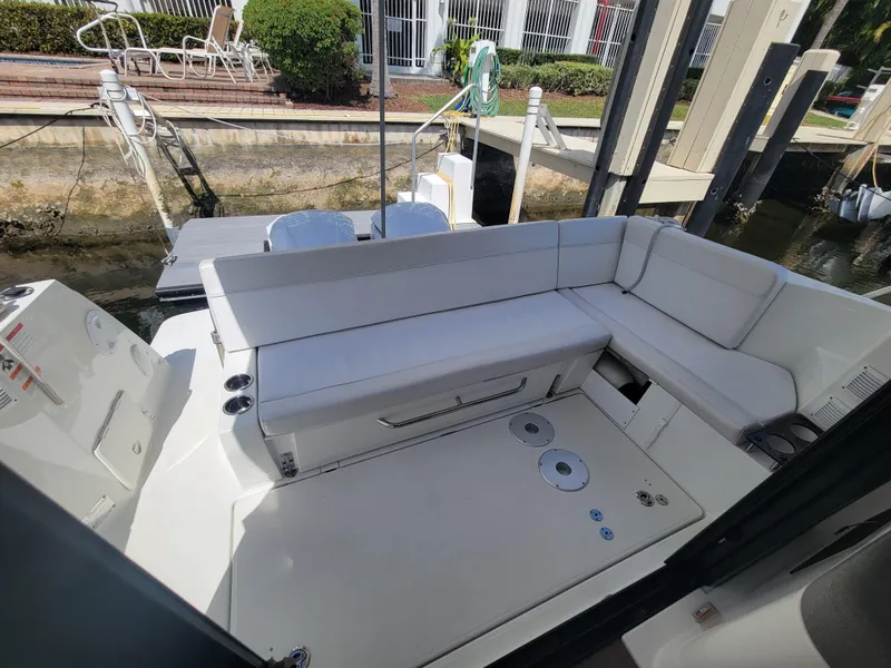 Slide: The Image of 2020 Jeanneau NC1095 boat with spacious seating area and modern design. - 13