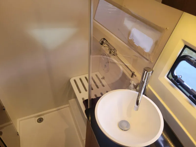 Slide: The Image of Modern bathroom in 2020 Jeanneau NC1095 boat with sink and shower. - 37