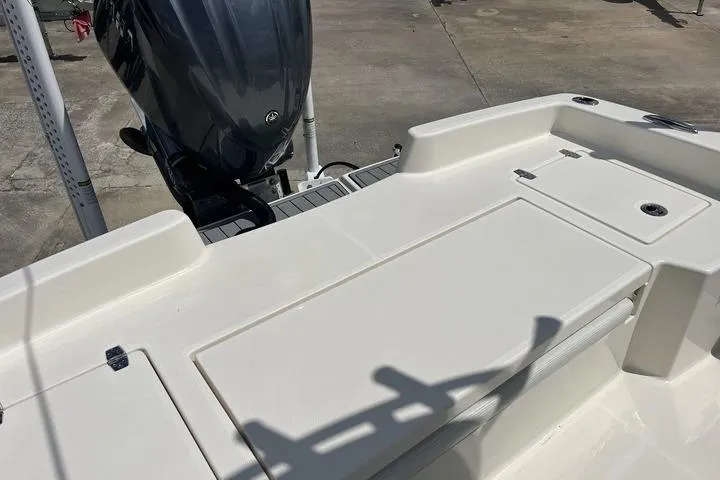 Slide: The Image of 2023 Pathfinder 2400 TRS boat deck with engine, showcasing sleek design and functionality. - 8