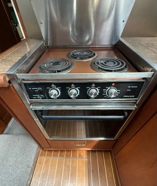 Slide: The Image of Kitchen stove in 1990 Bayliner 3888 Motoryacht. - 26