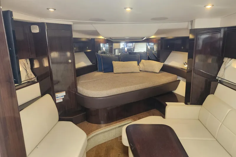 Slide: The Image of Luxurious interior of 2019 Sea Ray Sundancer 350 Coupe with elegant seating and cozy bed. - 14
