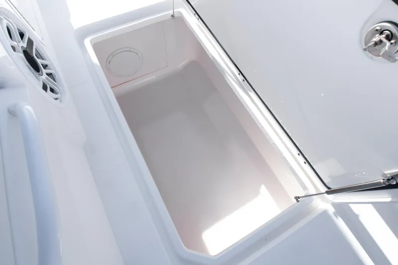 Slide: The Image of Open storage compartment on 2019 Invincible 40 Catamaran boat. - 28