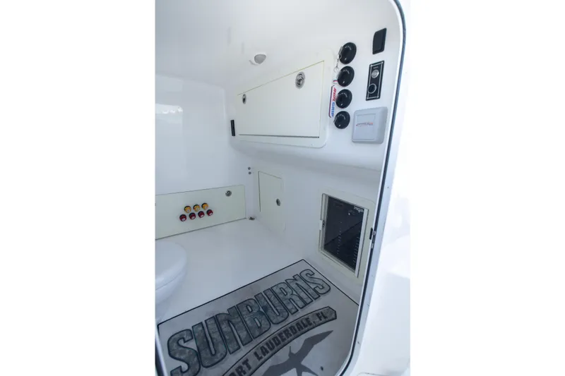 Slide: The Image of Interior of 2019 Invincible 40 Catamaran with control panels and storage compartments. - 30