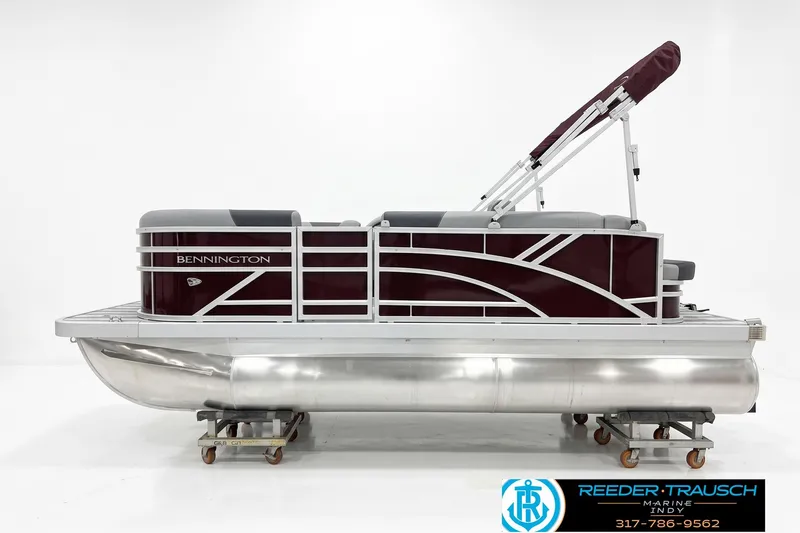 The Image of 2026 Bennington 168 SLJ pontoon boat with maroon and silver design, displayed indoors. - 1