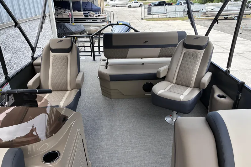 Slide: The Image of Luxurious interior of 2026 Starcraft EXS 1 Q DH boat with plush seating. - 10