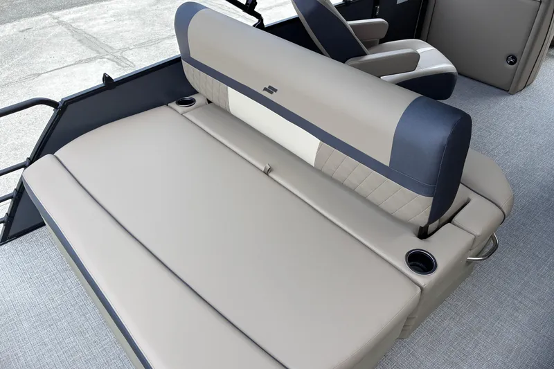Slide: The Image of Luxurious seating on 2026 Starcraft EXS 1 Q DH boat, featuring cup holders and premium upholstery. - 12