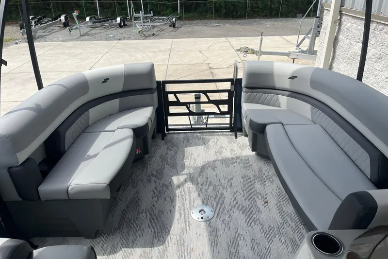 Slide: The Image of 2026 Starcraft EXS 3 FD boat interior with gray seating and modern design. - 13
