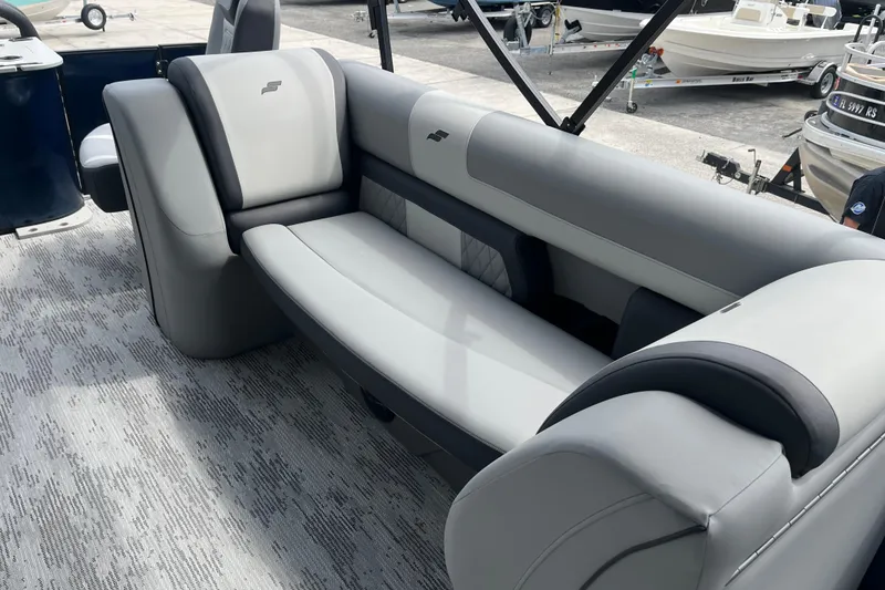 Slide: The Image of Luxurious seating on 2026 Starcraft EXS 3 FD boat, featuring sleek gray upholstery. - 22