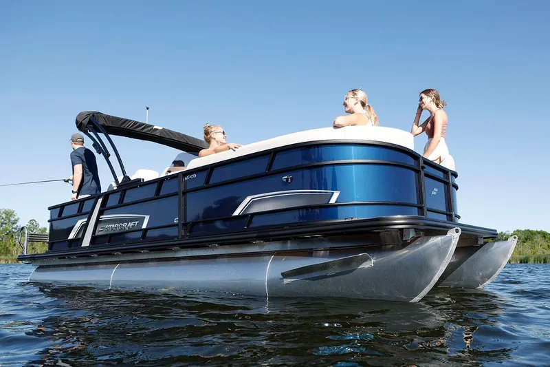 Slide: The Image of Manufacturer Provided Image: 2026 Starcraft EXS 3 FD pontoon boat on water with passengers enjoying a sunny day. - 3