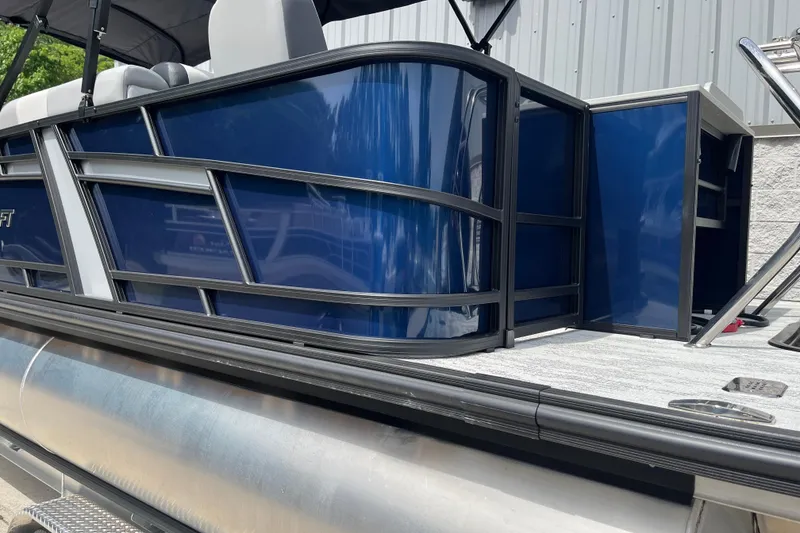 Slide: The Image of 2026 Starcraft EXS 3 FD pontoon boat with sleek blue exterior and modern design. - 35