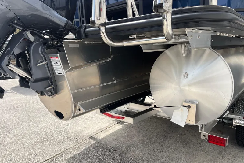 Slide: The Image of 2026 Starcraft EXS 3 FD boat engine and pontoon detail, showcasing sleek design. - 38