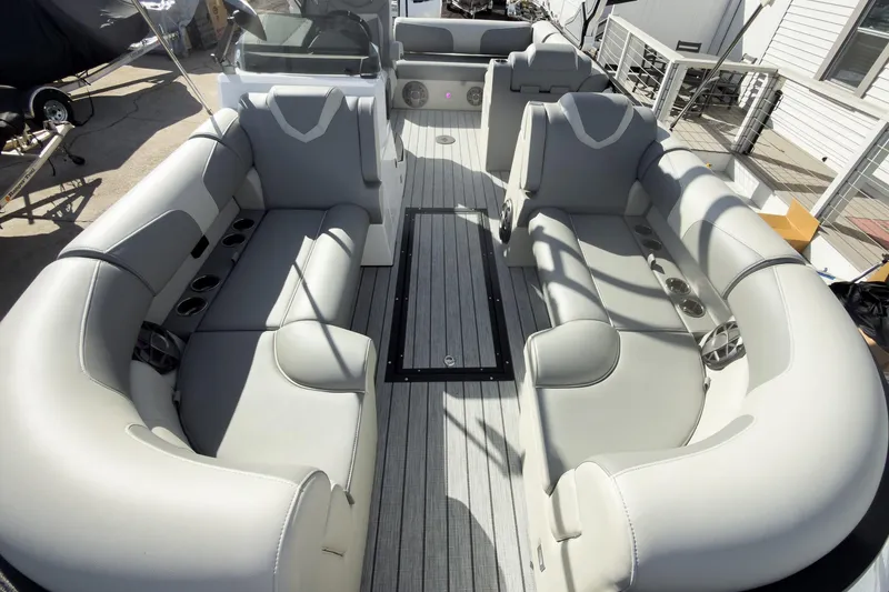 Slide: The Image of Luxurious interior of 2026 Montara Surf Boss 2.0 SL 23" boat with plush seating. - 11