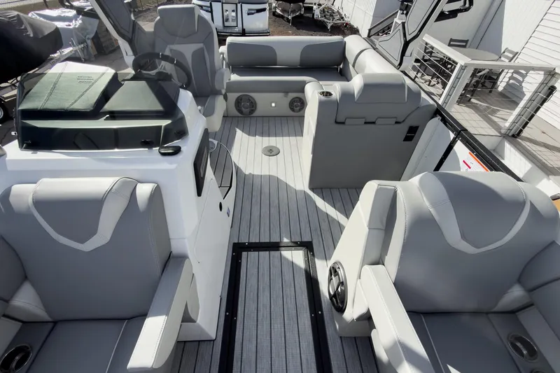 Slide: The Image of 2026 Montara Surf Boss 2.0 SL 23" boat interior with sleek gray seating and modern design. - 12