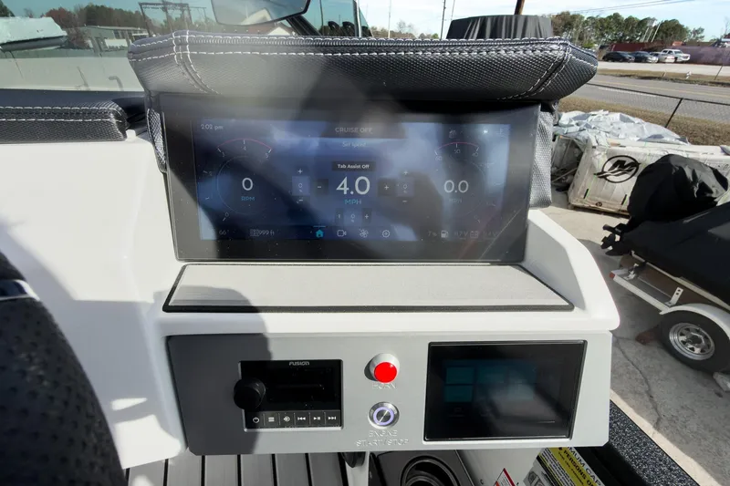 Slide: The Image of Dashboard of 2026 Montara Surf Boss 2.0 SL 23" with digital display and controls. - 16