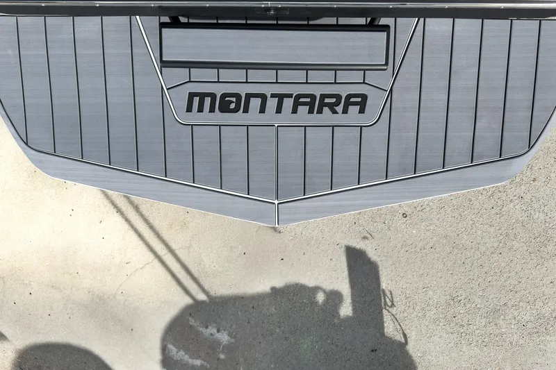 Slide: The Image of 2026 Montara Surf Boss 2.0 SL 23" boat deck with logo, featuring sleek design. - 22
