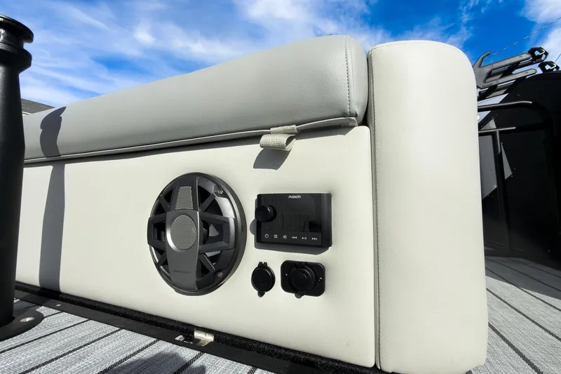 Slide: The Image of 2026 Montara Surf Boss 2.0 SL 23" boat interior with speaker and control panel. - 24