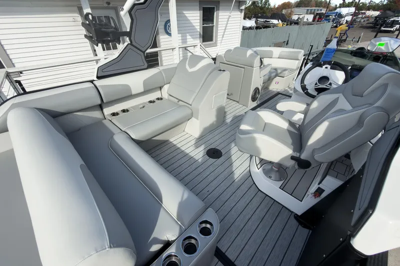 Slide: The Image of 2026 Montara Surf Boss 2.0 SL 23" boat interior with luxurious seating and modern design. - 25