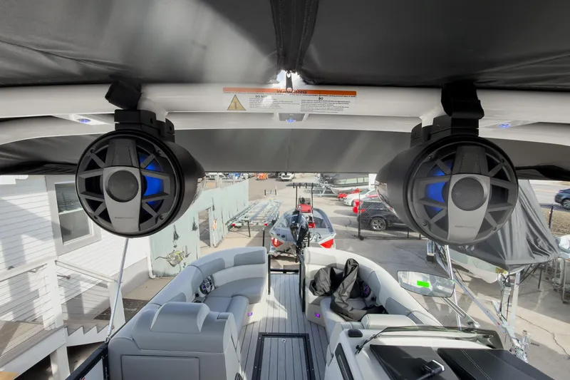 Slide: The Image of 2026 Montara Surf Boss 2.0 SL 23" boat interior with speakers and seating. - 27