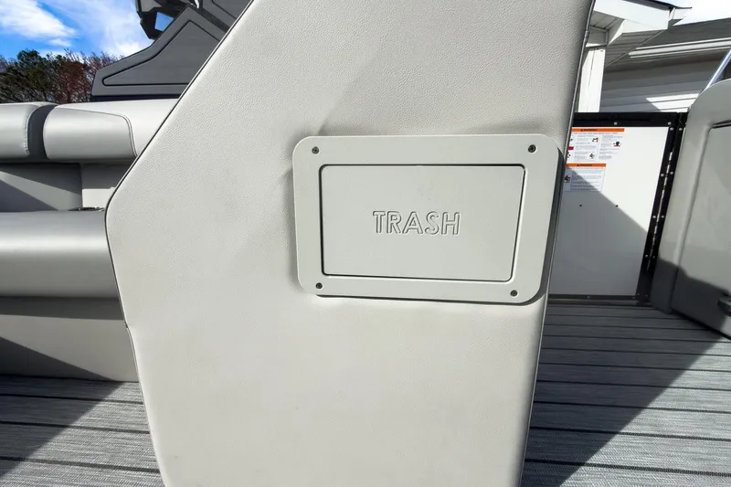 Slide: The Image of 2026 Montara Surf Boss 2.0 SL 23" boat interior with trash compartment. - 29