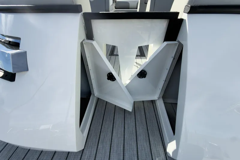 Slide: The Image of 2026 Montara Surf Boss 2.0 SL 23" boat interior with open storage compartment. - 30
