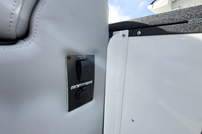 Slide: The Image of Switch panel on 2026 Montara Surf Boss 2.0 SL 23" boat interior. - 39