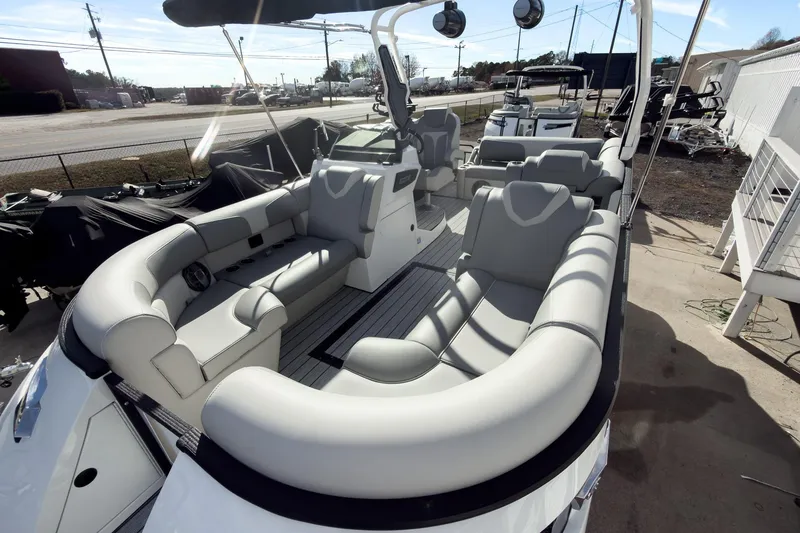 Slide: The Image of 2026 Montara Surf Boss 2.0 SL 23" boat interior with luxurious seating and modern design. - 6
