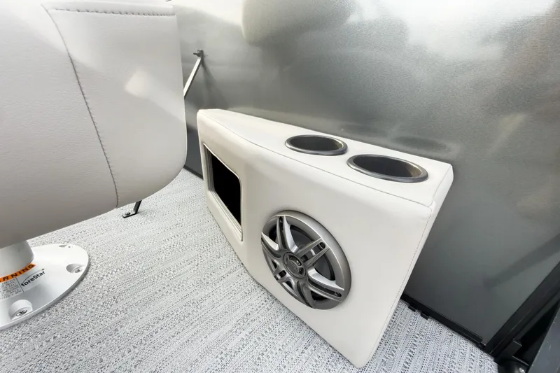 Slide: The Image of Interior of 2026 Godfrey Sweetwater Xperience Tritoon with speaker and cup holders. - 19