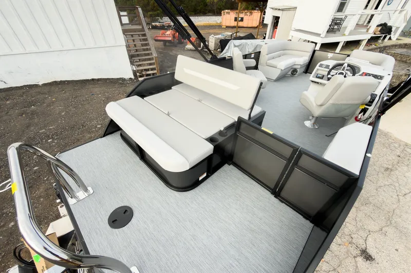 Slide: The Image of 2026 Godfrey Sweetwater Xperience 22' Tritoon with flip lounge seating and modern interior design. - 23