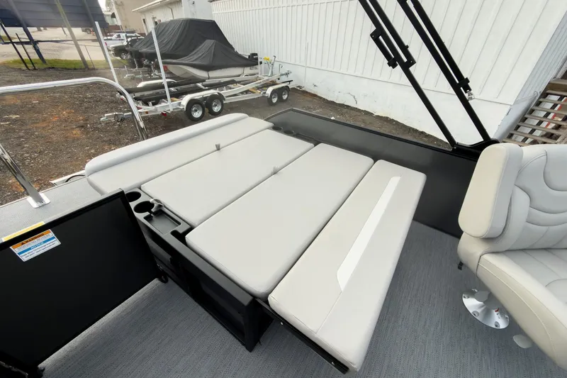 Slide: The Image of 2026 Godfrey Sweetwater Xperience 22' Tritoon with single flip lounge seating. - 27