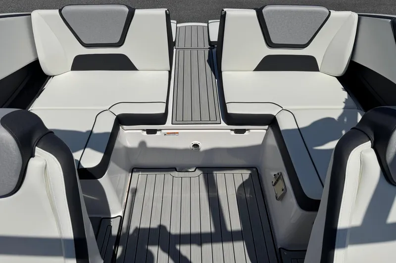 Slide: The Image of 2023 Yamaha Boats 222SD interior seating with sleek, modern design and comfortable upholstery. - 7