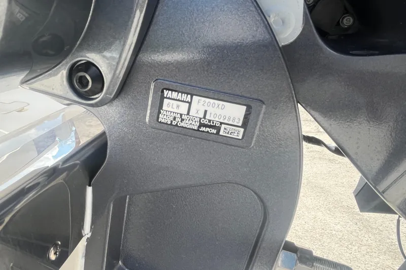 Slide: The Image of Close-up of Yamaha F200XD engine label on 2026 Pioneer 222 Islander boat. - 12