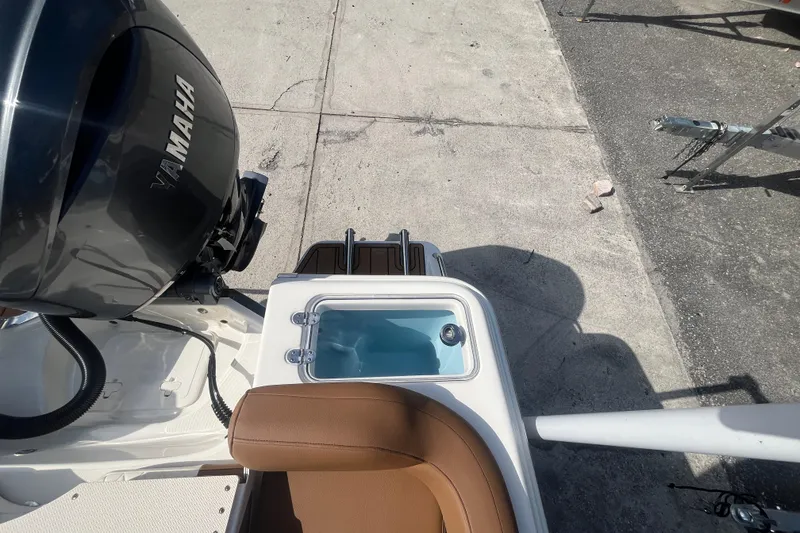 Slide: The Image of 2026 Pioneer 222 Islander boat with Yamaha engine, featuring a livewell and seating. - 42