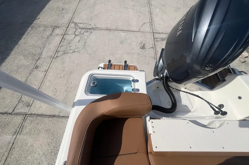 Slide: The Image of 2026 Pioneer 222 Islander boat with Yamaha engine and brown seating. - 43