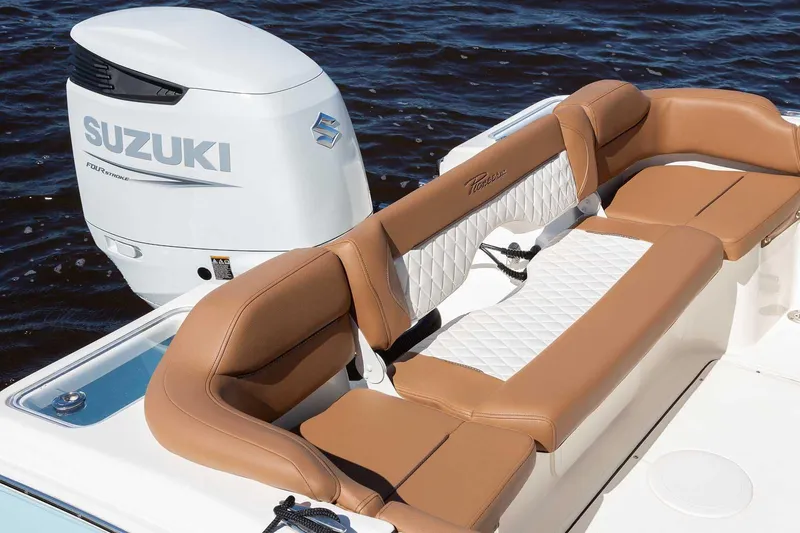 Slide: The Image of Manufacturer Provided Image: 2025 Pioneer 222 Islander boat with Suzuki engine, featuring tan and white seating. - 8