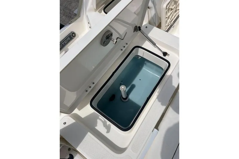 Slide: The Image of Livewell on 2021 Skeeter SX2250 boat, featuring a clean, spacious design. - 14